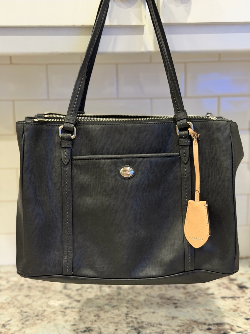 Coach Black Leather Shoulder Tote with Tan Luggage Tag